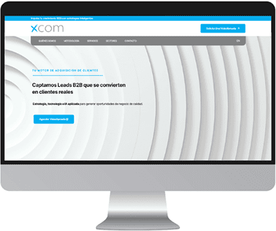 Maquetación web enfocada a captación de leads B2B para la plataforma Xcom.